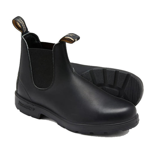 The Blundstone 510 Slip On Chelsea Black boots feature leather construction with elastic side panels and back tabs for easy wear. Designed for both men and women, they offer sturdy soles ensuring comfort, durability, and showcase a unique tread pattern wi