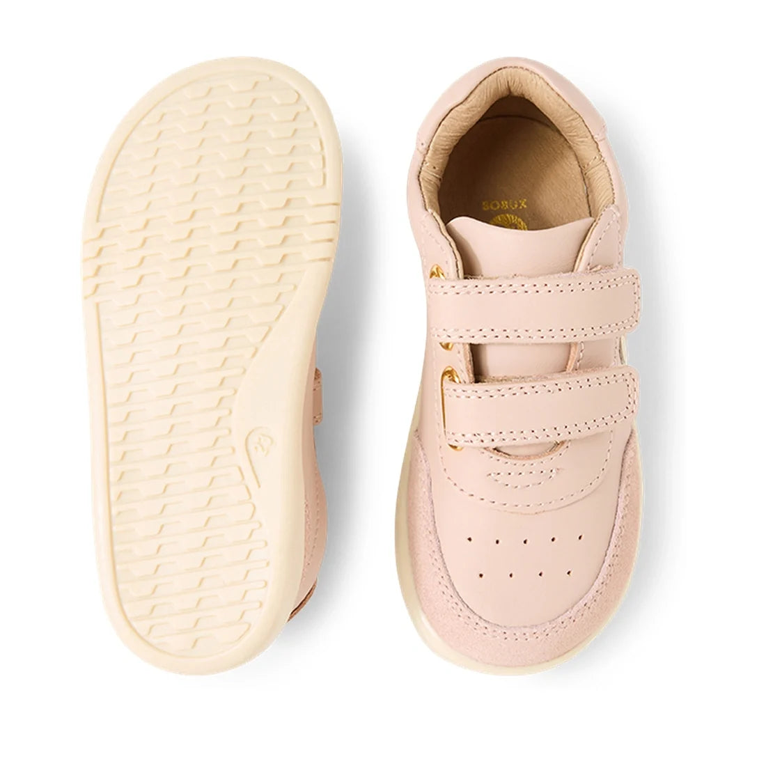 A pair of Bobux IW Iwalk Toddlers Champ Leather Sneakers in Cameo Rose Pink, featuring two Velcro straps and displayed from both the top and bottom to highlight the design and sole pattern., 9420068579248, 9420068579255, 9420068579262, 9420068579279, 9420