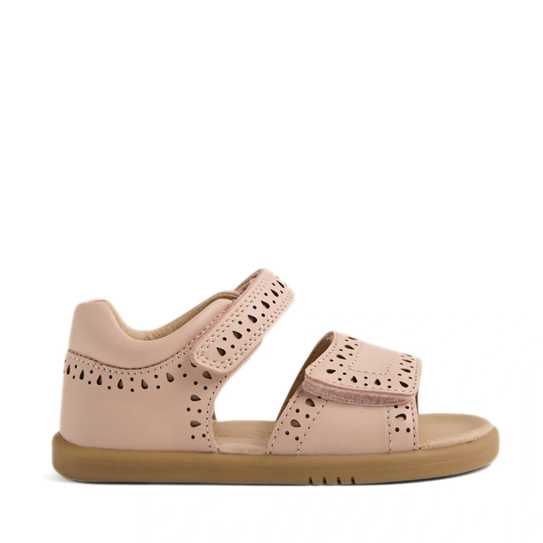 The Bobux IWalk Logan Toddlers Sandal in Cameo Rose Pink features an open toe design, two Velcro straps, decorative cutout patterns, a closed heel, and a tan rubber sole; shown in side profile against a white background., 9420074853172, 9420074853189, 942