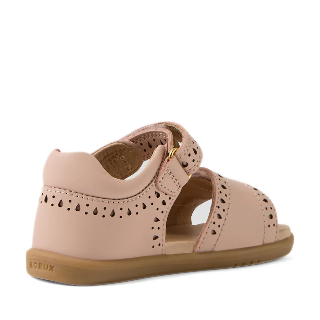 The Bobux IWalk Logan Toddlers Sandal in Cameo Rose Pink features soft leather with a closed heel, delicate cutout patterns, a convenient Velcro strap, and a tan rubber sole, shown from the back at an angle., 9420074853172, 9420074853189, 9420074853196, 9