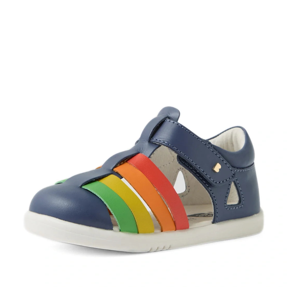 The Bobux IWalk Tidal Sandal Multi Vintage Indigo Closed Toe for toddlers features a water-friendly leather design in blue with a white sole and colorful rainbow straps—green, yellow, orange, and red—on the side, making it ideal for little adventurers., 9
