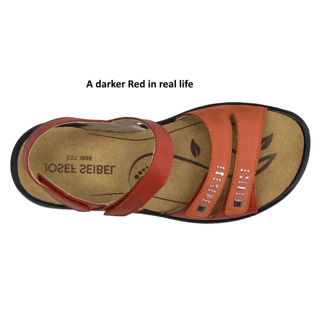 Top view of the Josef Seibel Ibiza 86 Womens Leather Comfort Sandal in Rot Red, showcasing two front straps adorned with silver studs and an ankle strap, all set on a tan footbed. Text above reads, A darker Red in real life., 53187, 4062838863208, 4062838