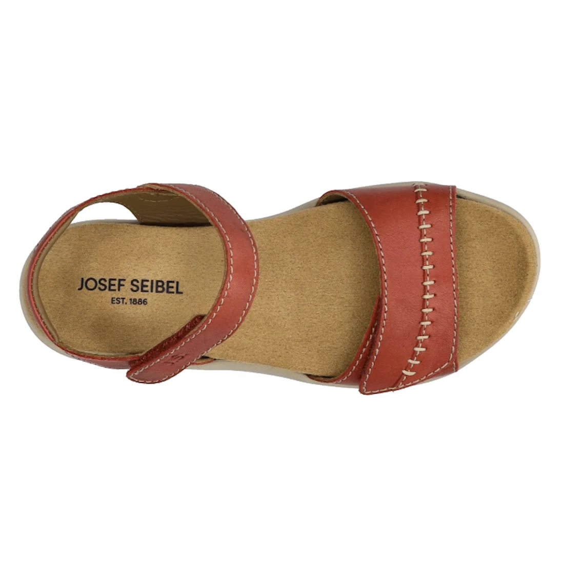 Top view of a single Josef Seibel Juliet 03 Women’s Leather Comfort Sandal in red-brown, featuring a velcro ankle strap, tan cushioned insole, and visible stitching on the front strap. “JOSEF SEIBEL EST. 1886” is printed on the insole—an elegant addition 