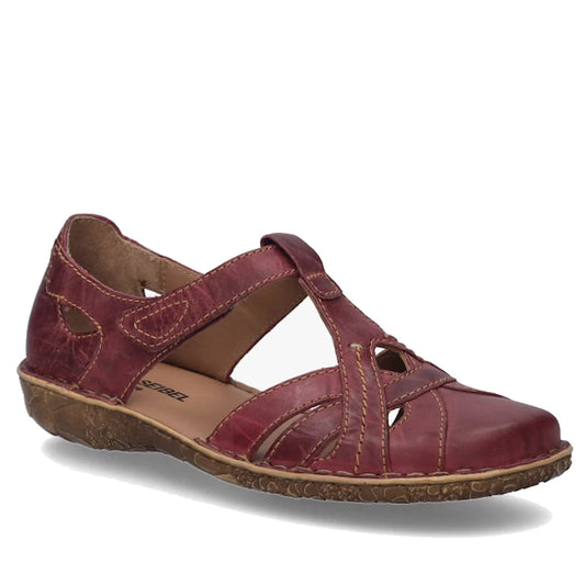 The Josef Seibel Rosalie 29 Orchidee Red Leather Women’s Covered Toe Sandal is displayed against a white background, showcasing its maroon leather construction with crisscross straps, decorative stitching, closed toe, cutout accents, and a textured brown 