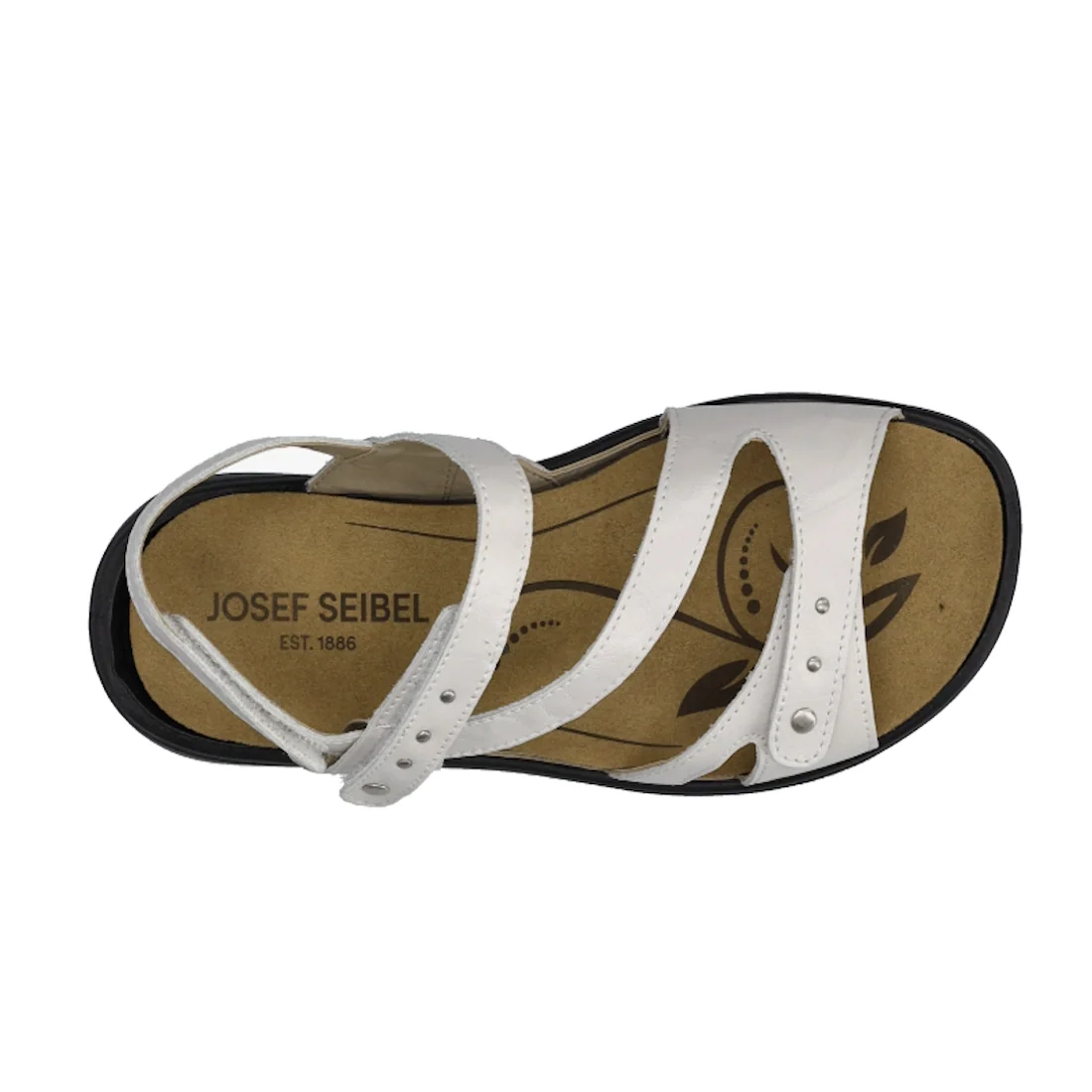 A top-down view of the Josef Seibel Ibiza 70 Women’s Leather Comfort Sandal in white shows a dual-strap design with metallic studs on one strap, a tan insole featuring a decorative leaf pattern, and a black sole., 4062838862096, 4062838862102, 40628388621