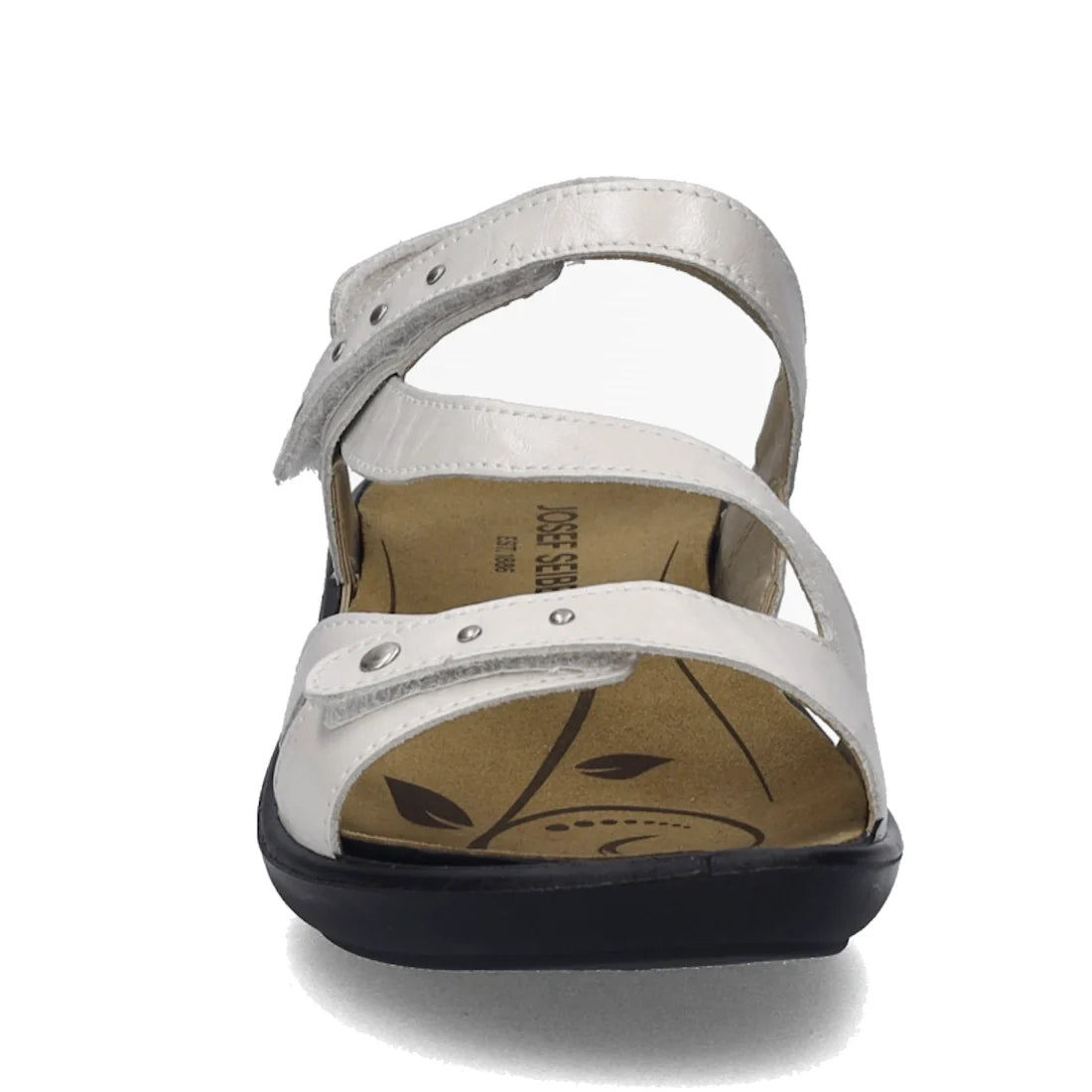 Front view of the Josef Seibel Ibiza 70 Women’s Leather Comfort Sandal in white, featuring two adjustable straps with visible metal studs and a cushioned insole adorned with a leaf pattern. Inspired by the classic Ibiza 70 design, these sandals showcase a