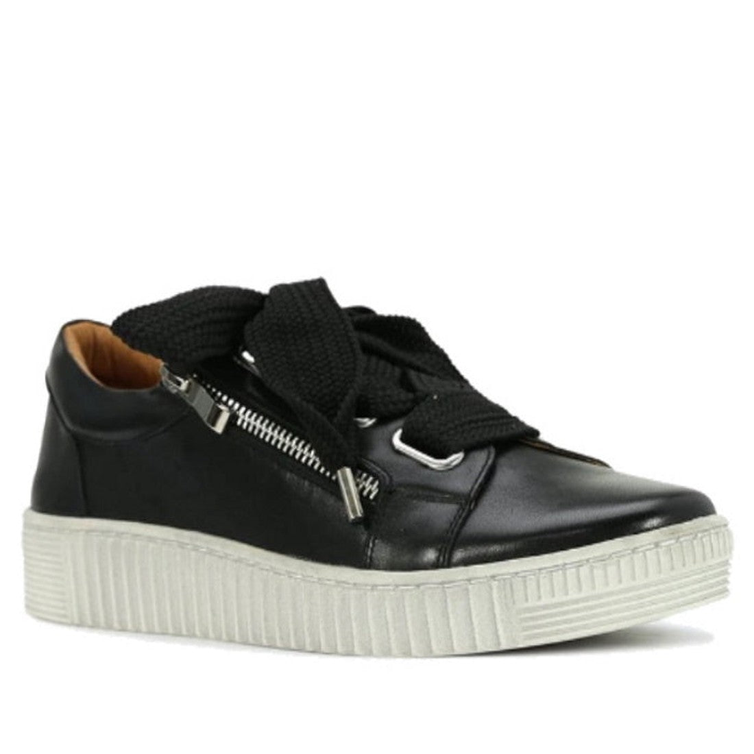 The EOS Jovi Leather Trainer features black Italian leather, thick black laces, a silver side zipper, tan inner lining, and a chunky rubber sole. The shoe is shown angled to display both its side and front.