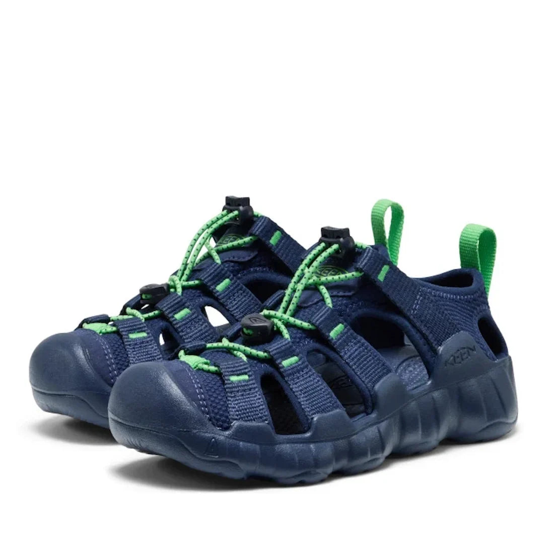 A pair of Keen Kids Hyperport H2 shoes in Naval Academy and Vibrant Green, featuring a closed toe, green no-tie elastic laces, green pull tabs, and a rugged sole—perfect for outdoor activities.