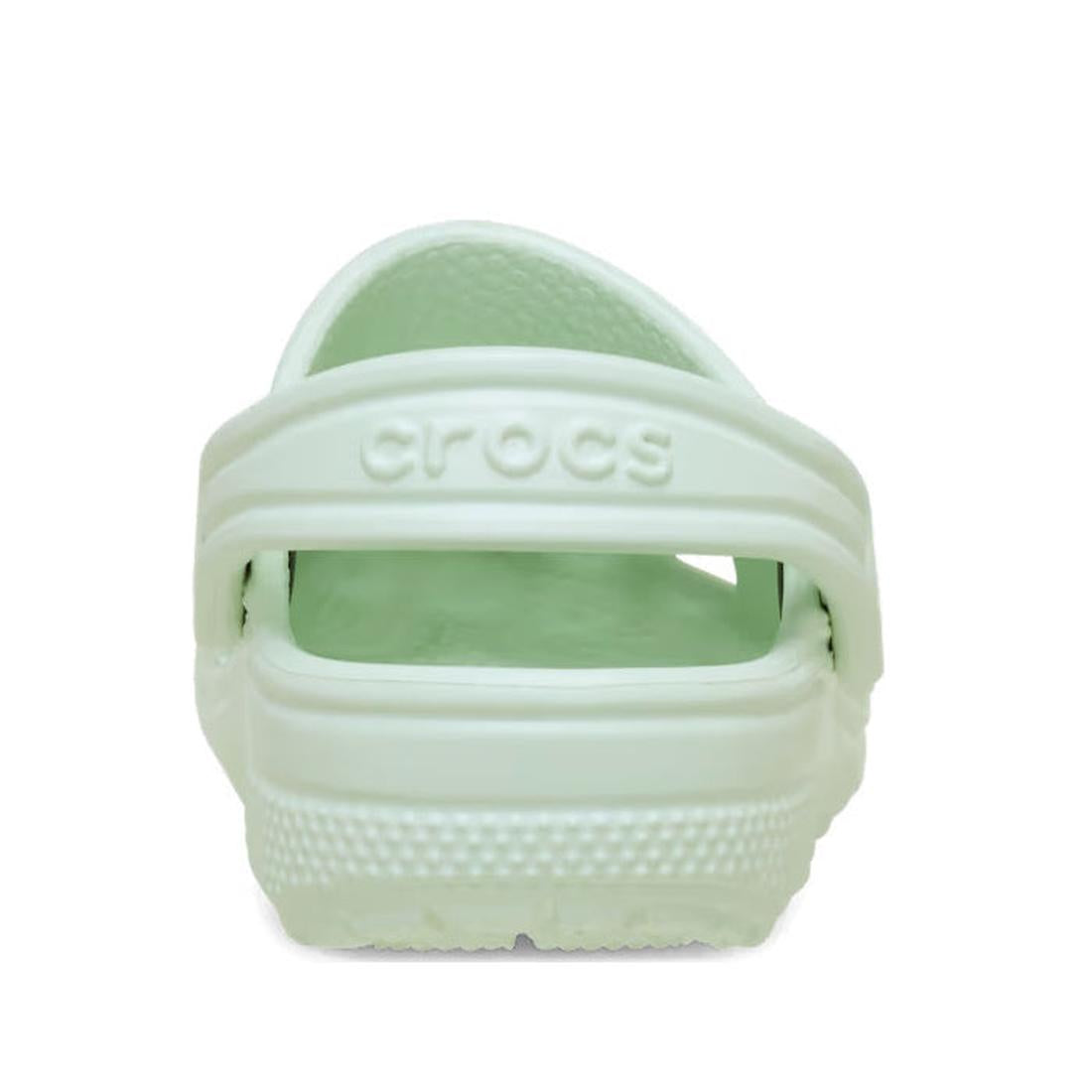 Light green heel view of a toddlers crocs sandal backstrap with 'Croc' branding on a white background.,
198445206931,
198445206948,
198445206955,
198445206962,
198445206900,, 46491, 198445206931, 198445206948, 198445206955, 198445206962, 198445206900