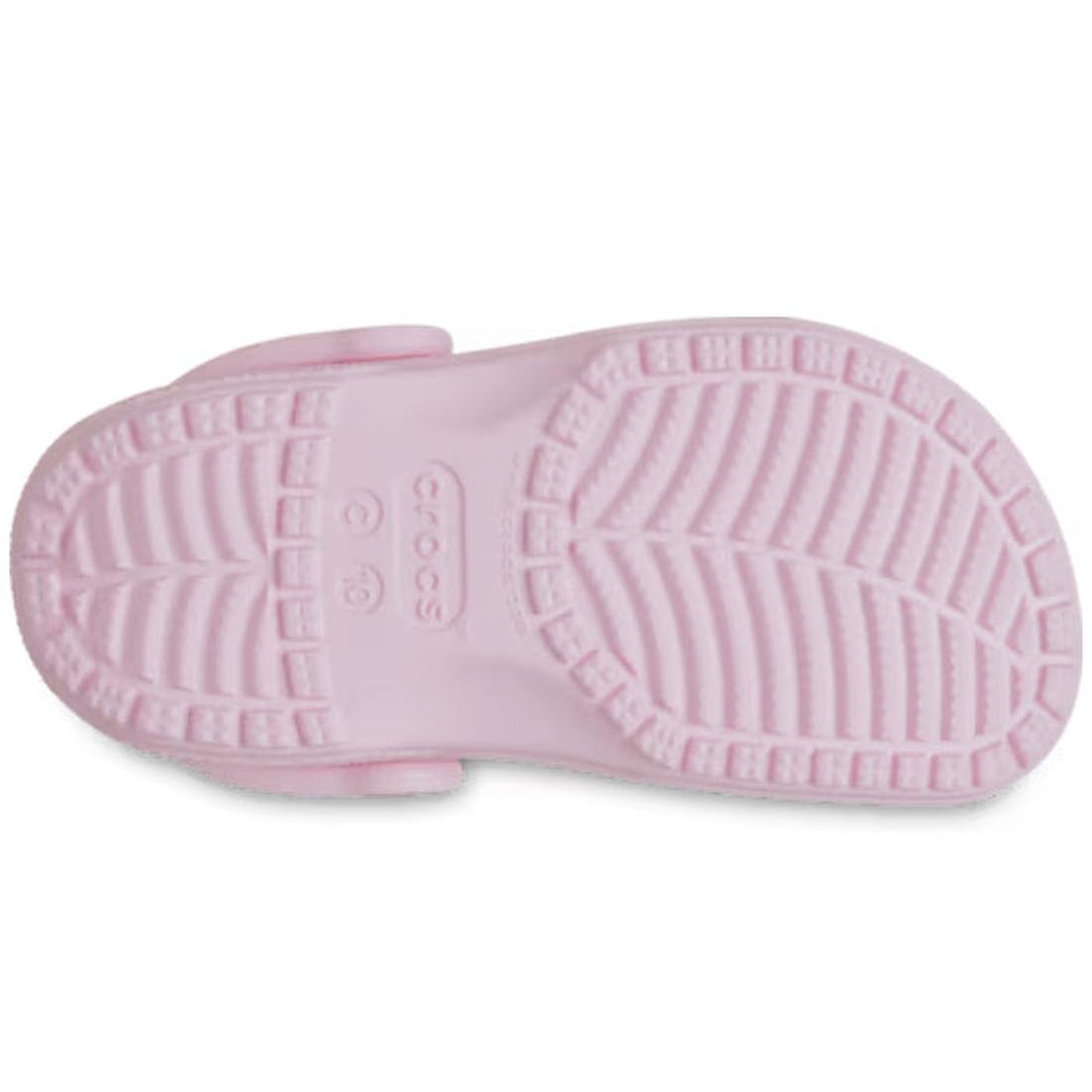 Close-up of a toddlers Crocs classic pink sandal sole with brand logo on a white background.,
198445102905,
198445102912,
198445102929,
198445102936,
198445102875,, 46497, 198445102905, 198445102912, 198445102929, 198445102936, 198445102875