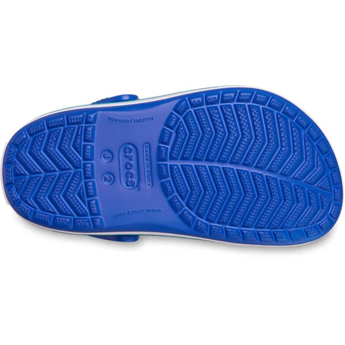 The image displays the sole of a Crocs Kids - Crocband Classic Clog K Blue Bolt Teal Youths, showcasing a textured non-slip pattern, Crocs Comfort, the Crocs logo, and size details near the heel., 49846, 49847, 49848, 49849, 49850, 49851, 49852, 49853, 49