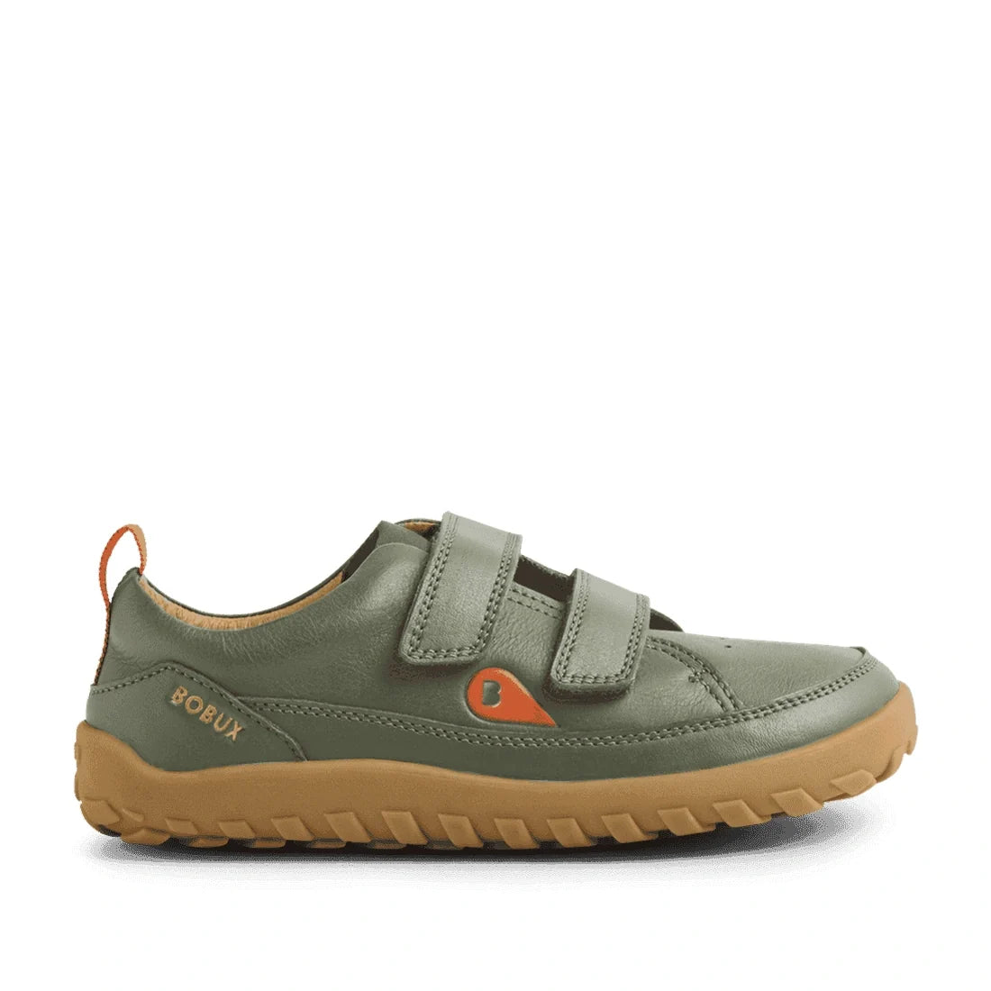 The Bobux KP Kids Plus Dawn Leather Sneaker in Vetiver Green is a child’s shoe crafted from green leather, featuring two Velcro straps, a brown rubber sole, and orange accents such as the pull tab and logo. Designed to support natural foot movement with i