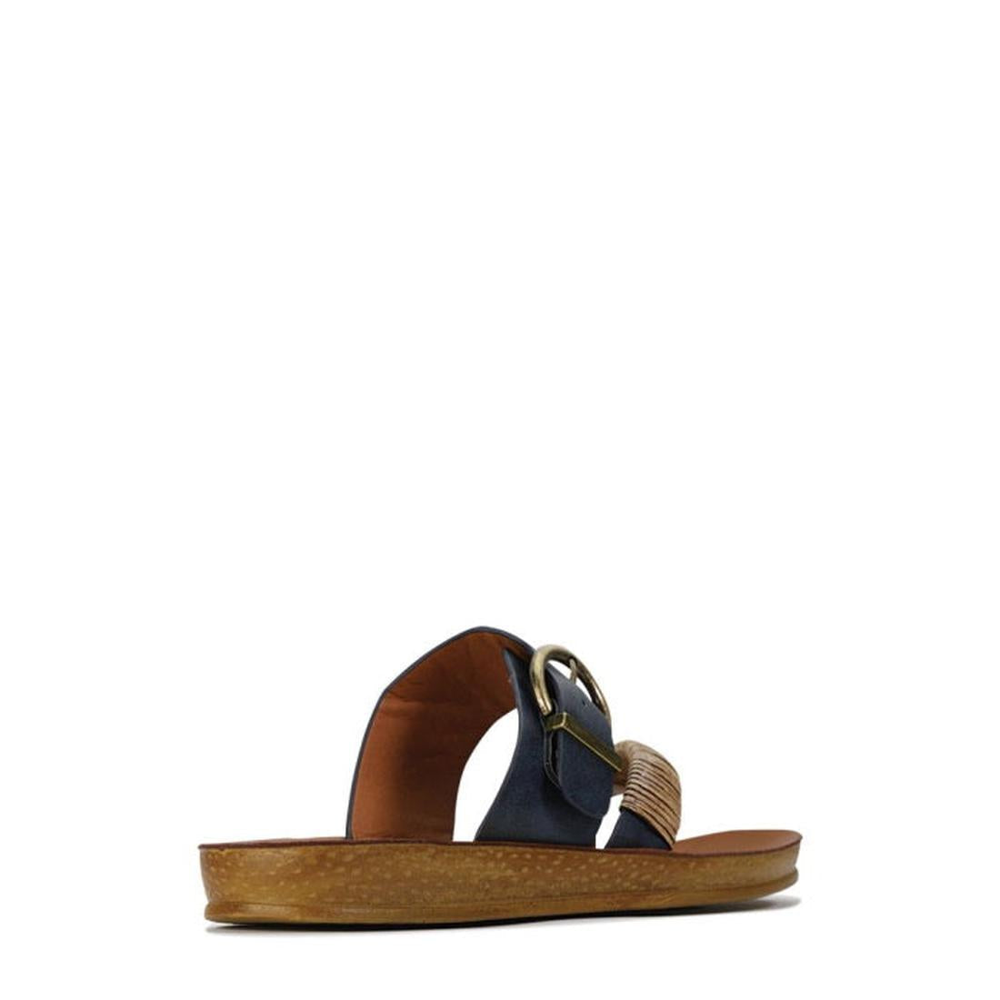 The Los Cabos Bria Blue Light Flexible Sandal Jandal Navy features a wooden sole, navy strap, large gold buckle, and braided tan accent—stylish women's summer sandals shown from the side on a white background., 236222, 9321191161815, 9321191161822, 932119