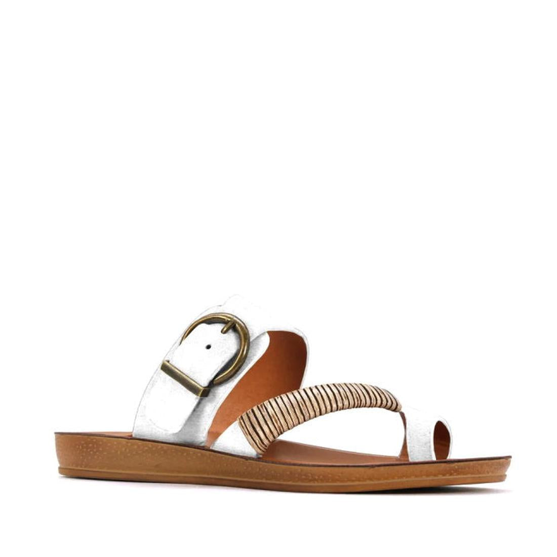 The Los Carbos Bria Off-White Light Flexible Sandal Jandal features a crisp off-white design with a large gold buckle, tan sole, and a stylish striped beige elastic band across the top. This open-toe sandal with a low heel is perfect for effortless style 