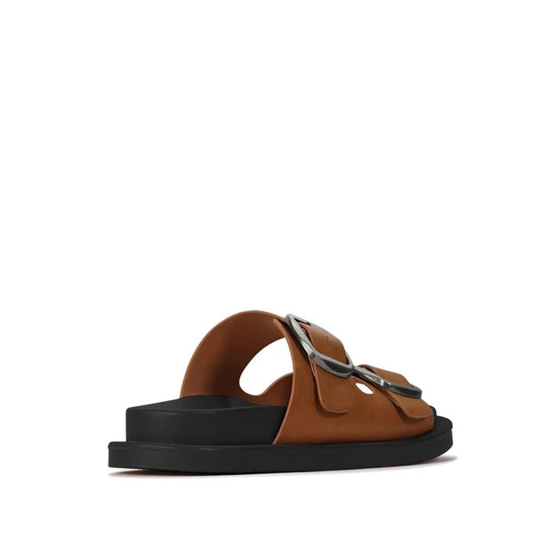 The Los Cabos Womens Slide Ando with Arch Support in Brandy features two wide brown straps with large silver buckles, a thick black sole, and a cushioned footbed for comfort, shown on a plain white background., 49722, 49716, 49717, 49718, 49719, 49720, 49