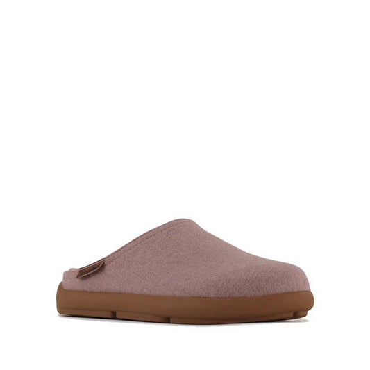 The Los Cabos Felton Graphic Lavender Women's Felted Slipper House is a mauve slip-on with a soft fabric upper and cushioned sole, ideal for cozy slipper lovers, shown against a white background.