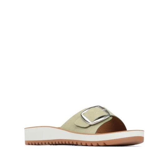 Los Cabos Naja Women's Slide Single Strap Sandal Sage Green- showing side view of the right foot of the comfy flexible synthetic sandals slides for women