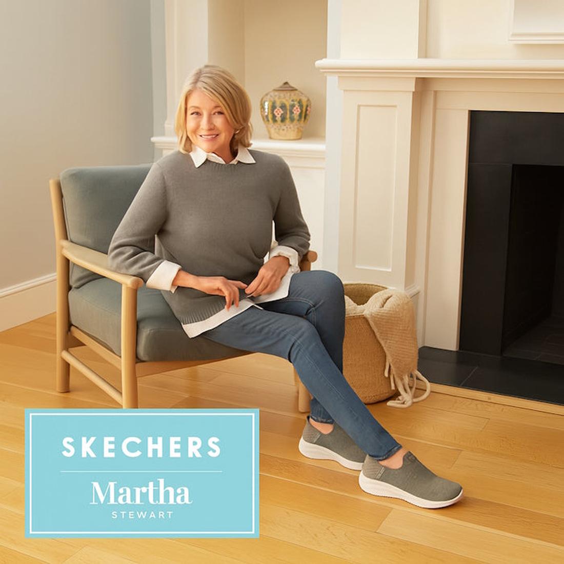 Martha Stewart sitting on a chair in a living room with 'Skechers Martha Stewart'  slip in shoes branding.
196989023366,
196989023373,
196989023380,
196989023397,
196989023403,
196989023427,
196989023434,, 196989023366, 196989023373, 196989023380, 1969890