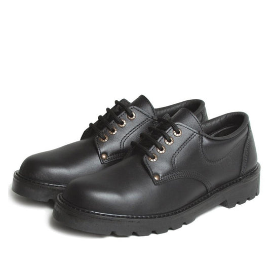 A pair of McKinlays Delta Senior School Shoe Black leather for big kids, wide fit with sturdy chunky rubber soles, sits side by side on a white background.