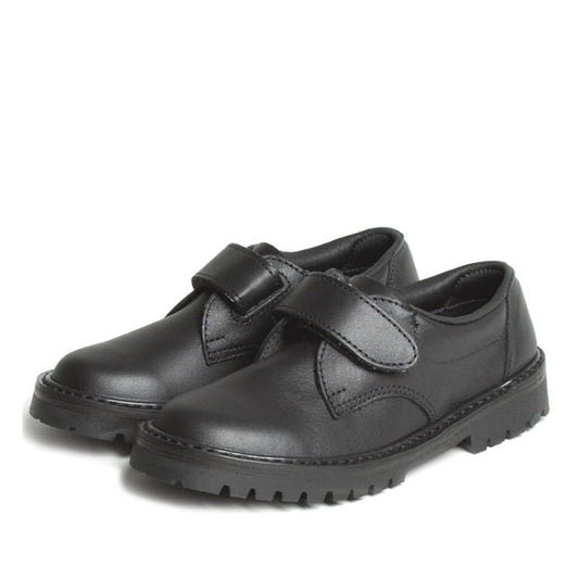 The McKinlays Kids Rip Black Velcro School Shoe is a wide fit black leather school shoe with thick rubber soles and hook-and-loop straps, shown on a white background.