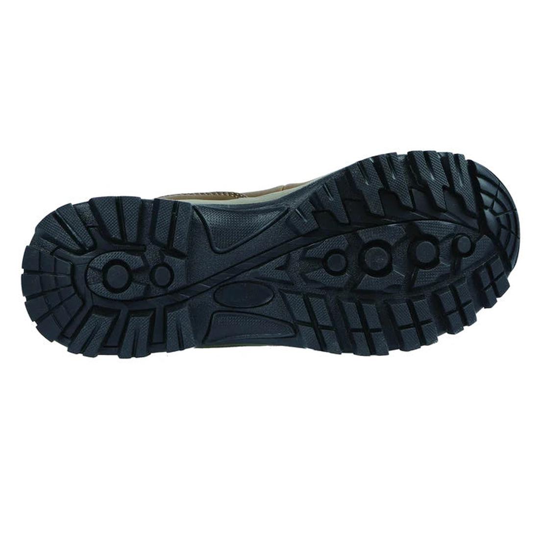 Northside Apex Lite Women's Mid Boot in brown, showing its sturdy black rubber sole with rugged tread for great grip—perfect for adventures.  ksnz