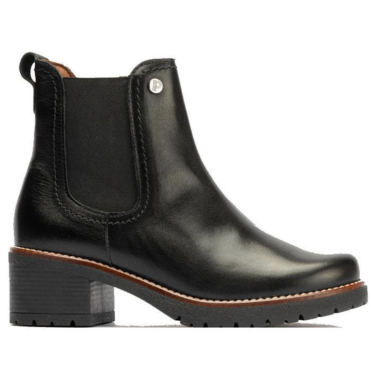 A side view Pitillos black leather ankle boot with a heel, elastic gusset on the outside, and a zipper on the inside.