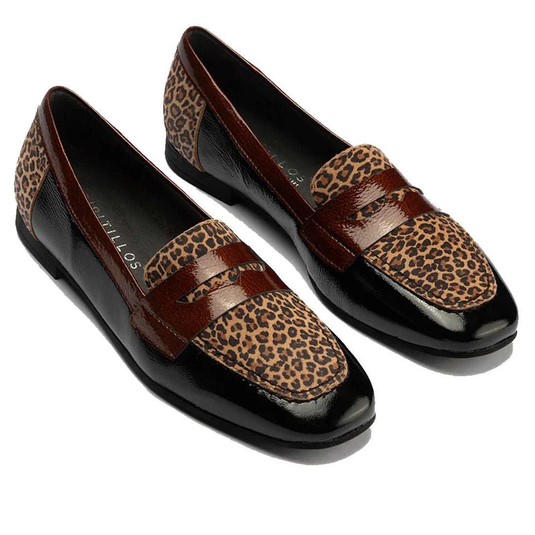 The Pitillos Womens Black Flat Patent Loafer Moccasin 10870 features leopard print accents on the toes and heels, glossy black patent sides, and brown leather detailing, shown against a plain white background.,