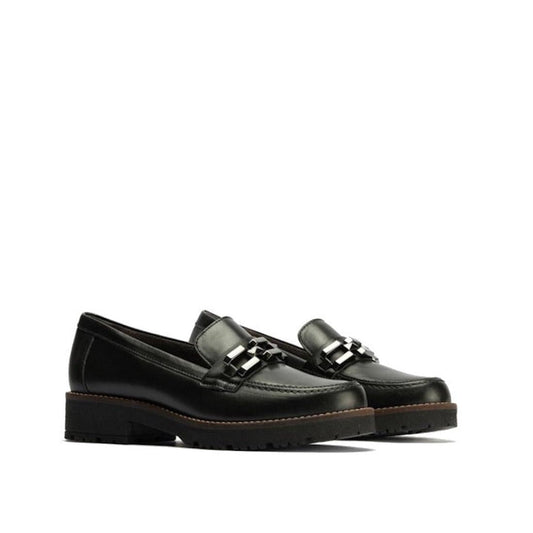 The Pitillos Womens Chunky Slip On Loafer 10775 in black nappa leather features chunky soles and a striking pewter embellishment, shown against a plain white background.