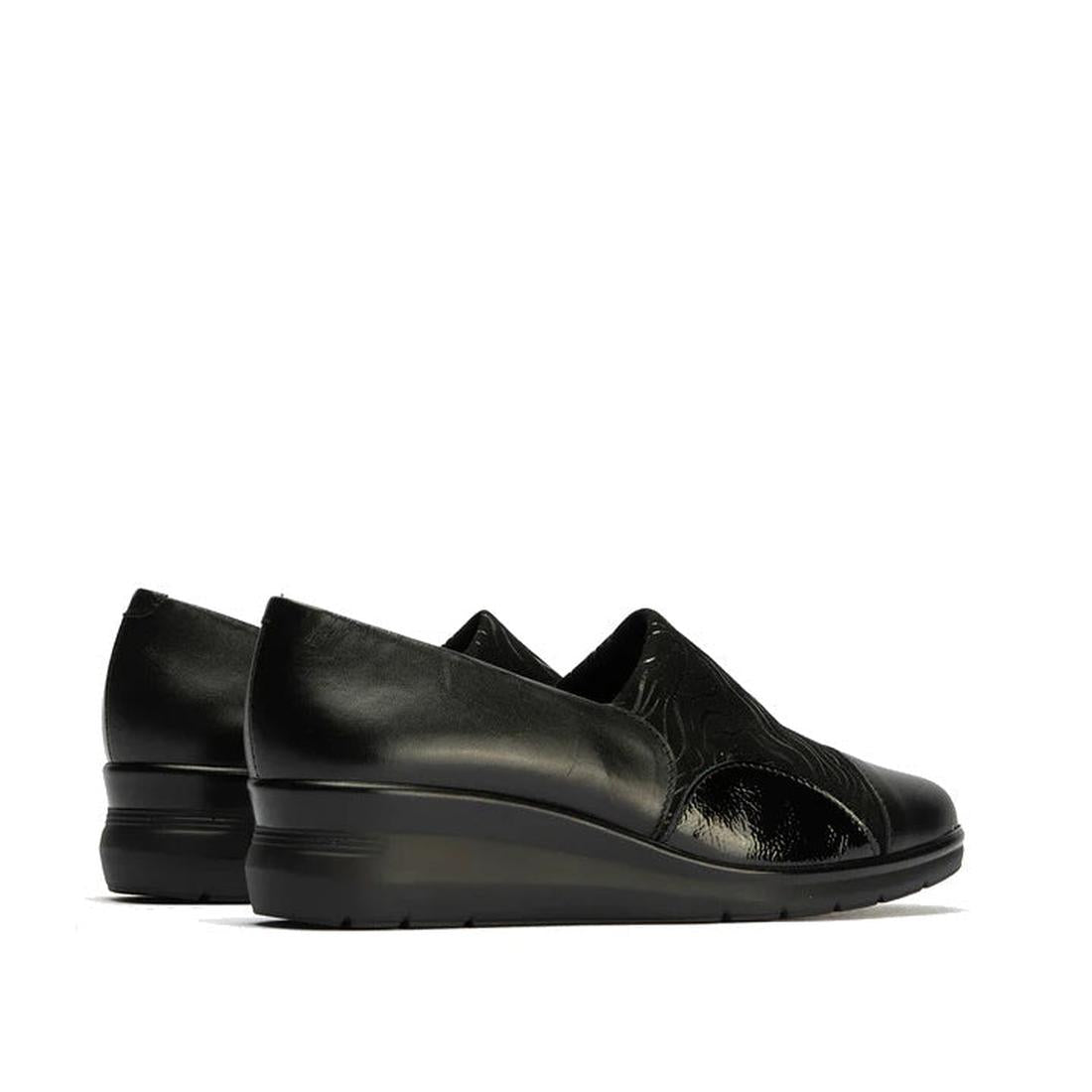Pitillos Womens Lycra and Patent Leather Shoe 10731—a pair of black slip-on wedge shoes with matte lycra and glossy patent leather finishes, removable innersole, shown from the back and side on a white background., 8445191655554, 8445191655561, 8445191655