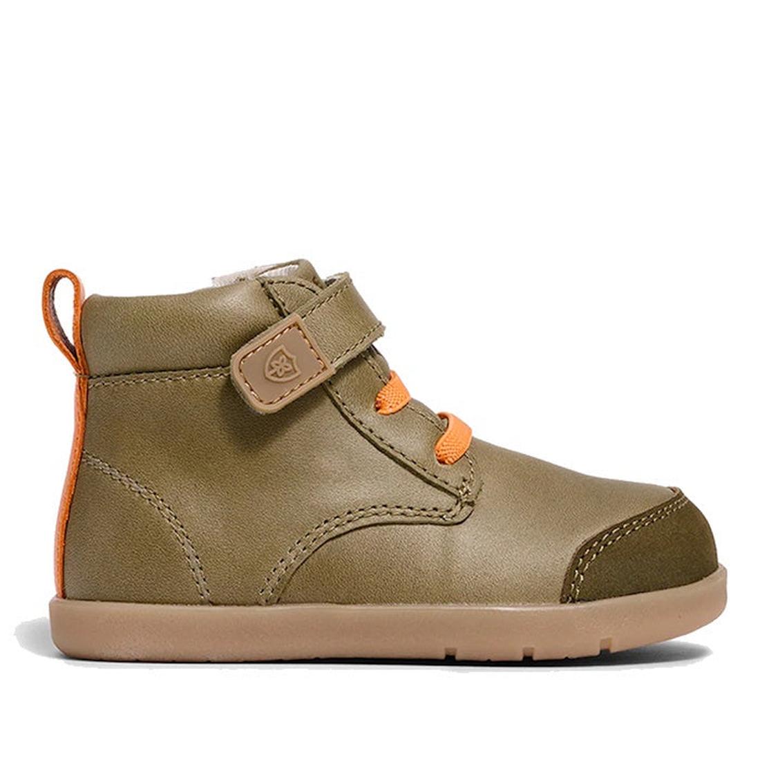 The Pretty Brave Jessie First Walker Hi Top Leather Olive Green is a genuine leather toddler sneaker in olive green with orange laces, velcro strap, and an orange heel pull tab, shown in side profile on a white background.