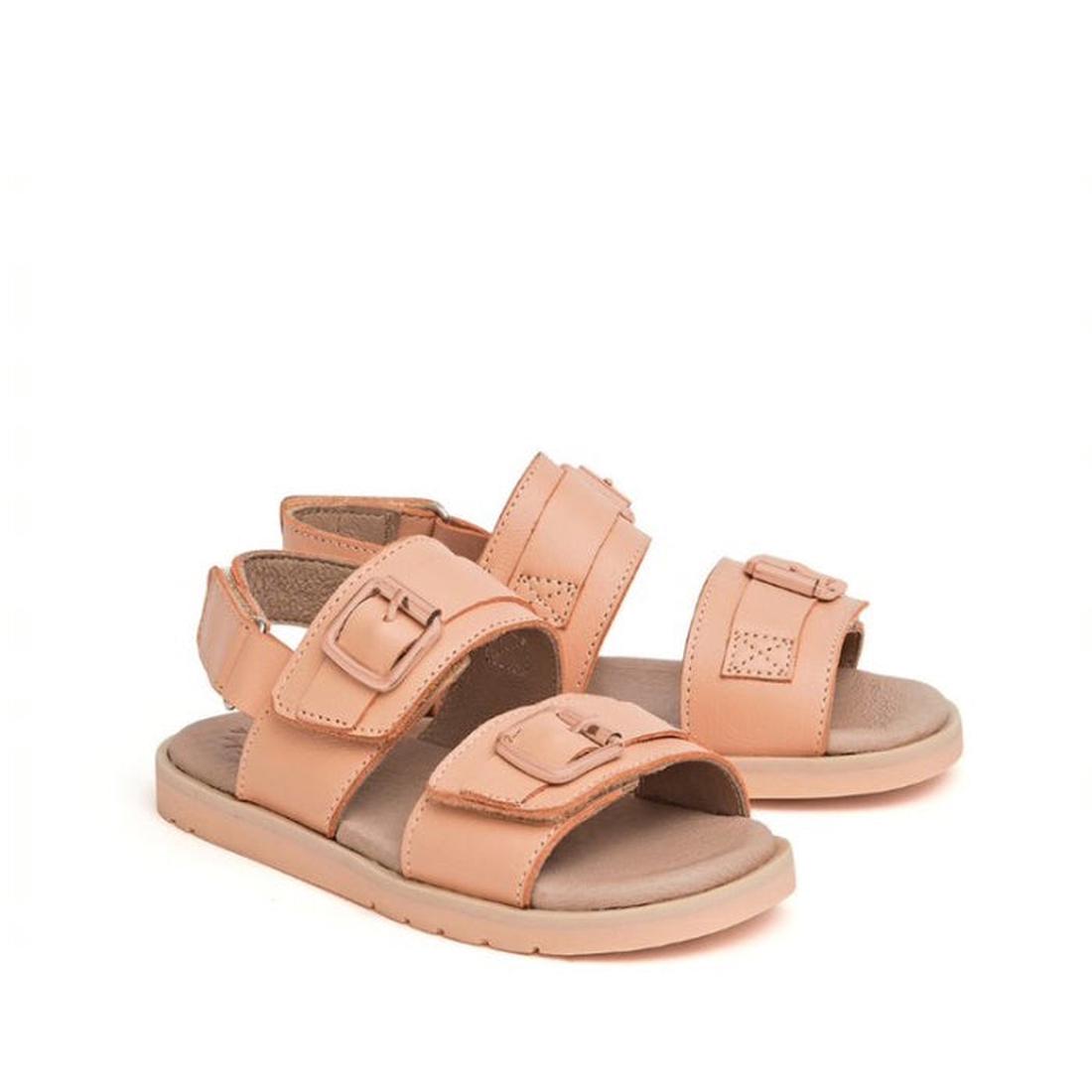 A pair of Pretty Brave Alex Leather Sandal Coral in sizes 29-33 (CLEARANCE, NOT RETURNABLE), featuring adjustable velcro straps, cushioned leather footbed, and open-toe design, displayed on a white background.