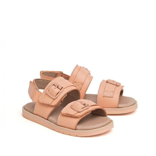 A pair of Pretty Brave Alex Leather Sandal Coral in sizes 29-33 (CLEARANCE, NOT RETURNABLE), featuring adjustable velcro straps, cushioned leather footbed, and open-toe design, displayed on a white background.