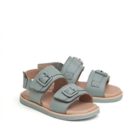 A pair of Seaform Blue leather kids sandals with two adjustable buckle straps and an ankle strap, flat sole, and open toe—just like the Pretty Brave Alex Leather Sandal (sizes 29-33). CLEARANCE NOT RETURNABLE.
