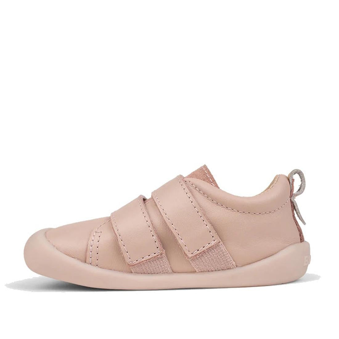 The Pretty Brave First Walker Toto Leather Trainer in Dusky Pink is a light pink leather sneaker featuring two Velcro straps, a rounded toe, and a heel pull tab, shown in side view against a white background., 9420075366329, 9420075366312, 9420075366305, 