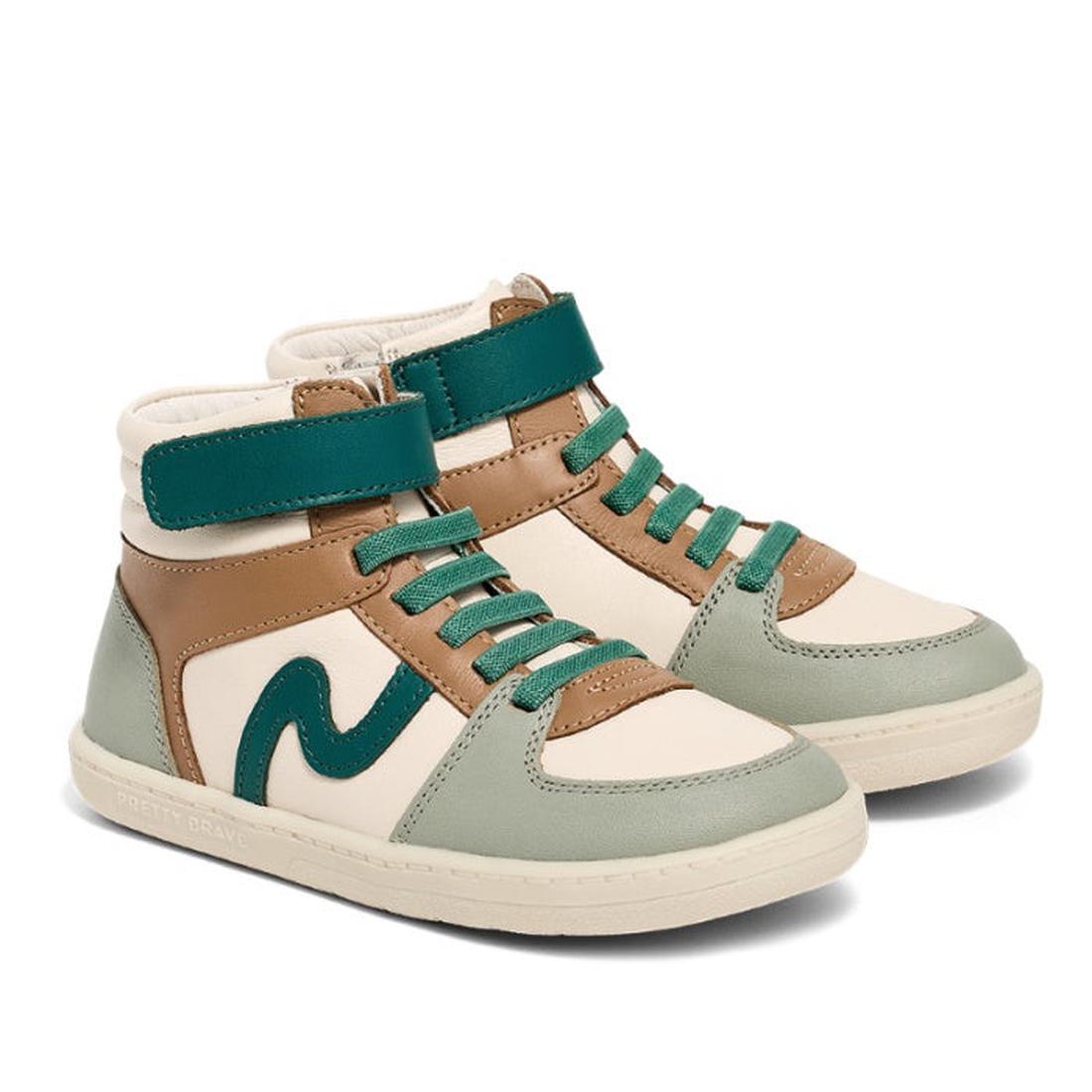 The Pretty Brave Hi Top Boot Forest Mix features green, brown, and off-white panels, teal laces and strap, a wavy teal side design, and light beige soles for comfort and support.