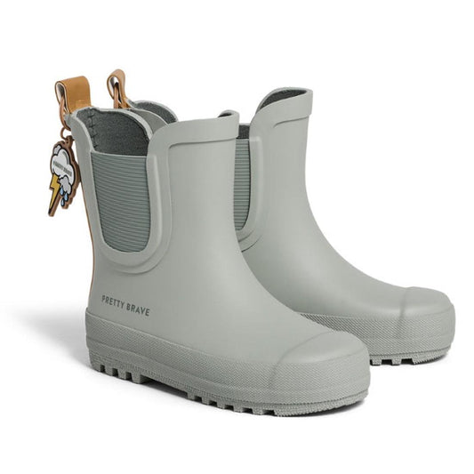 Pretty Brave Puddle Boot Ankle Rainboot in sage green, with grippy ridged soles, stretchy sides, tan pull tabs and fun cloud charm.  ksnz