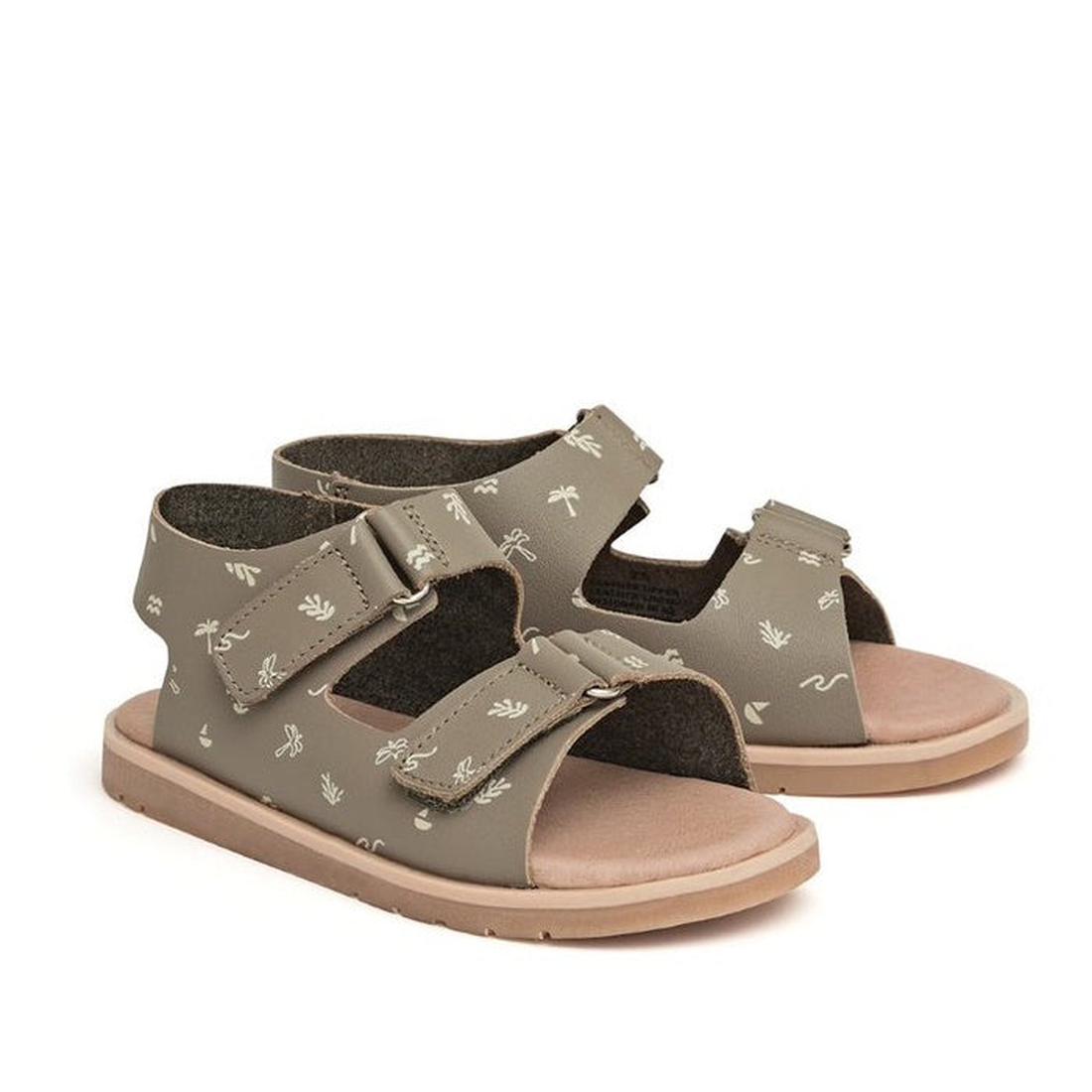 A pair of Pretty Brave Wilder Reef Green Kids Sandals (sizes 29-31, not returnable), featuring adjustable Velcro straps and open toes, is displayed on a plain white background.