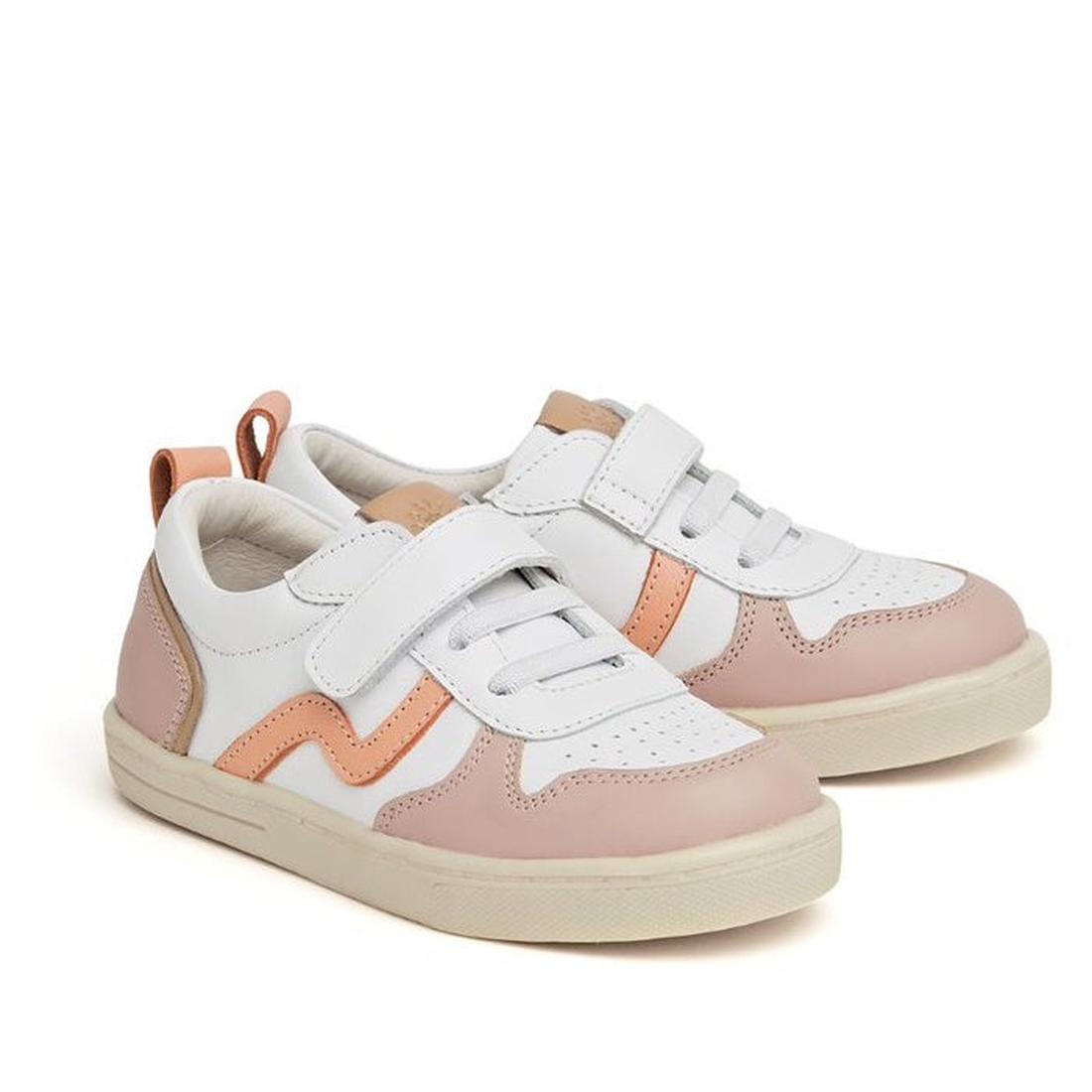 Pretty Brave XO Trainer White Coral kids’ sneakers (sizes 29-33) in white with pink-peach details, grippy soles, and easy Velcro.  ksnz