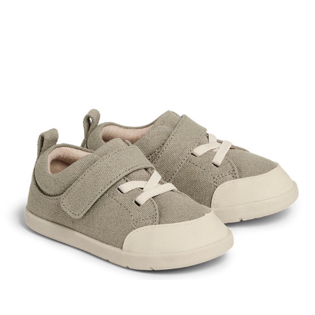 Pretty Brave Boston CANVAS Trainer First Walkers in soft olive green, with sturdy white soles, elastic laces, and easy Velcro straps.  ksnz