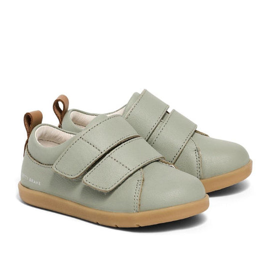 Pretty Brave Brooklyn First Walker Kicks—sage green toddler shoes with tan soles, comfy Velcro straps, and easy brown pull tabs.  ksnz