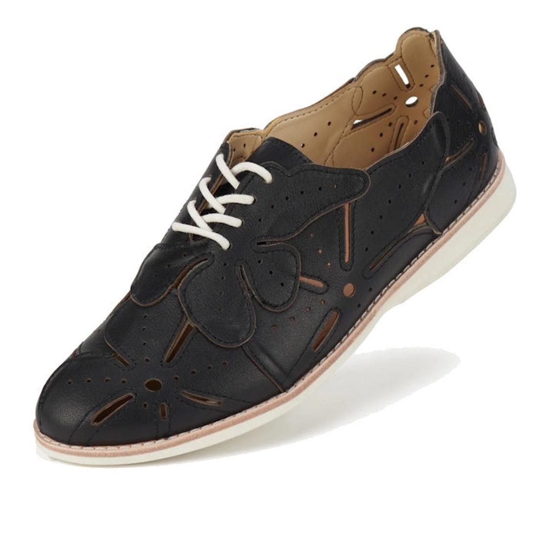The Rollie Derby Applique Black Womens Leather Brogue Shoe features soft black leather uppers, decorative cutouts, a flower-shaped appliqué, white laces, and a white rubber sole—an Australian-designed classic.