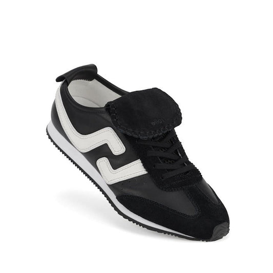 Rollie Womens Shift Black/Bone Sneaker features cozy black and white style, suede lace flap, zigzag trim, and cushioned EVA sole.  ksnz