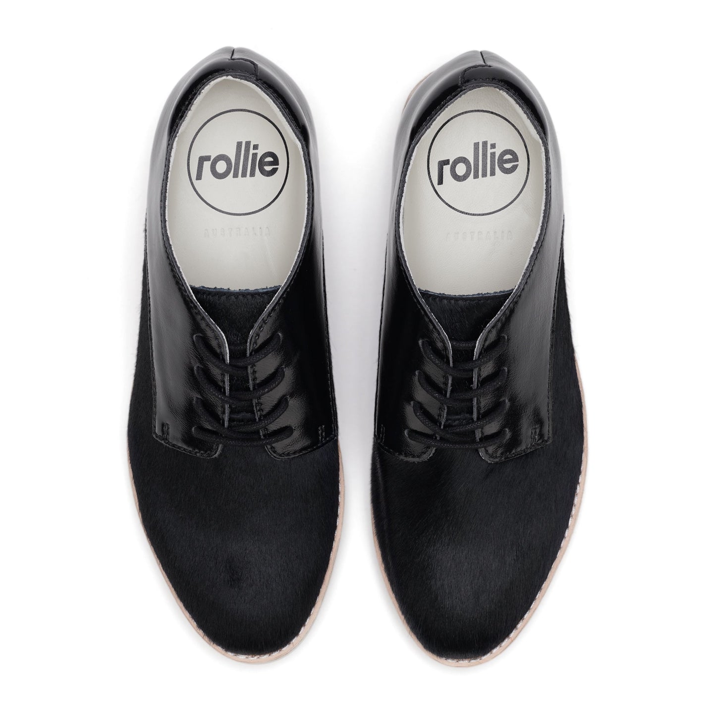 The Rollie Womens Derby Black Splice Leather Brogue Shoe features a polished black lace-up design, white outsoles, visible Rollie insoles branding, and an orthotic-friendly removable footbed for comfort., 51190, 9339554014920, 9339554054292, 9339554007458