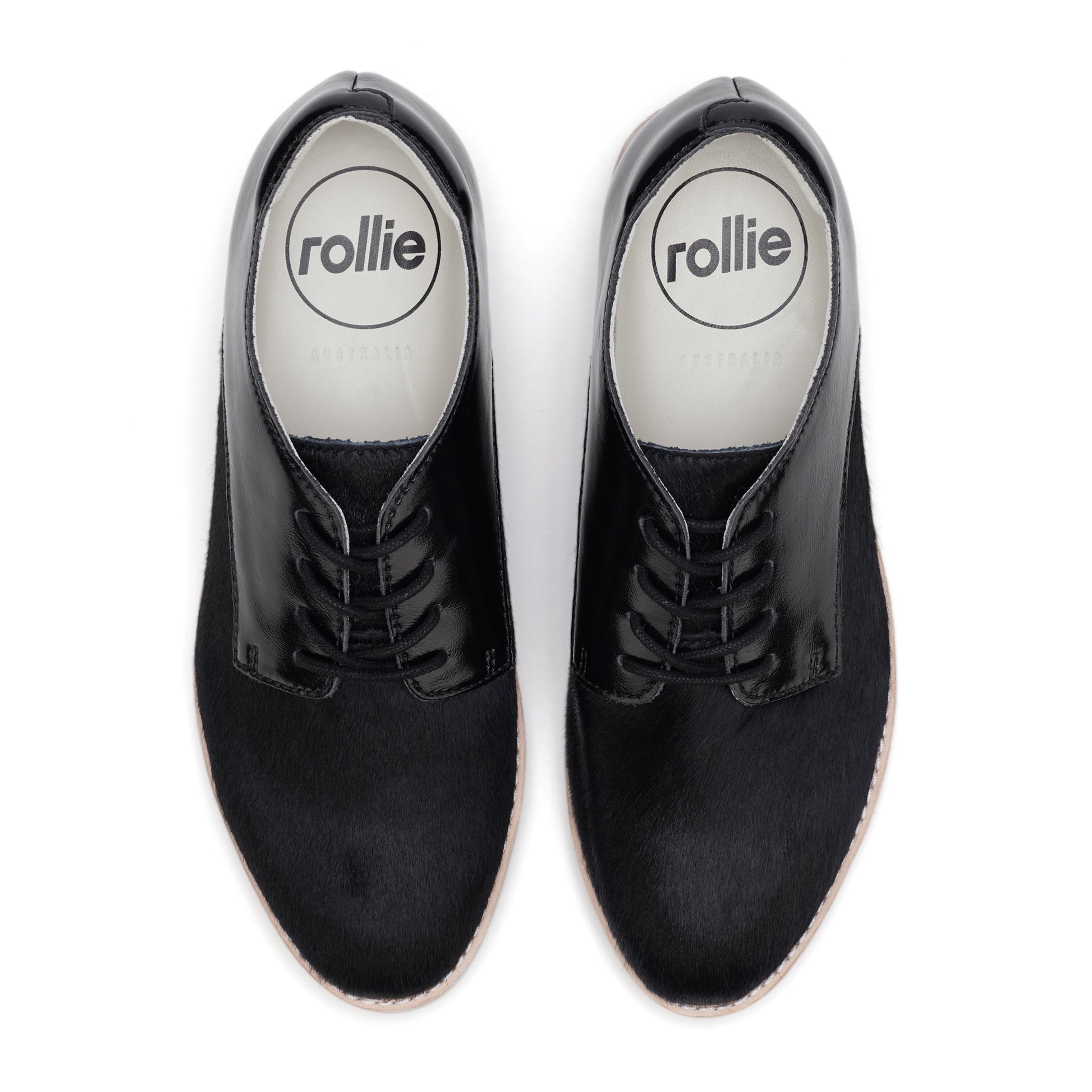 The Rollie Womens Derby Black Splice Leather Brogue Shoe features a polished black lace-up design, white outsoles, visible Rollie insoles branding, and an orthotic-friendly removable footbed for comfort., 51190, 9339554014920, 9339554054292, 9339554007458