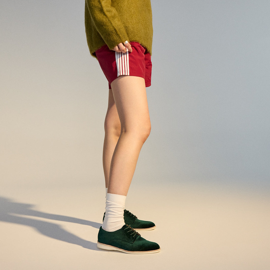 A family-ready look: Rollie Womens Derby Emerald Green Velvet Brogues with comfy white soles and easy lace-up closure, worn with bright socks.  ksnz, 9339554068114, 9339554005690, 9339554000077, 9339554000336, 9339554023830