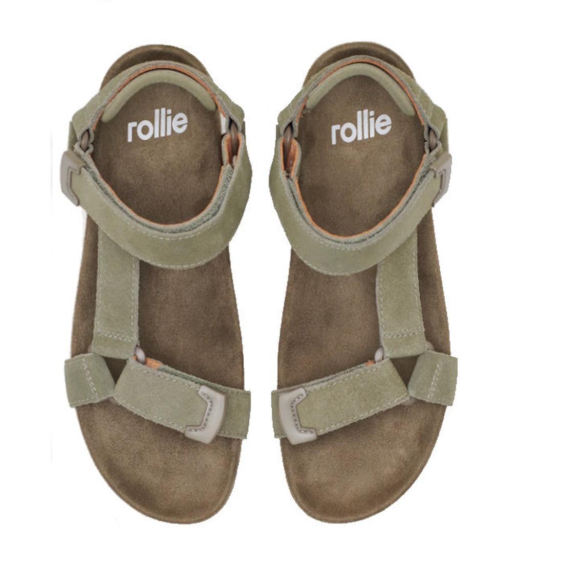 The Rollie Womens Sandal Tooth Wedge in Sage/White features olive green suede, adjustable sheep leather straps, a white "rollie" logo on the insoles, and a comfy EVA sawtooth wedge sole. Photographed from above on a white background., 48171, 9781760793883
