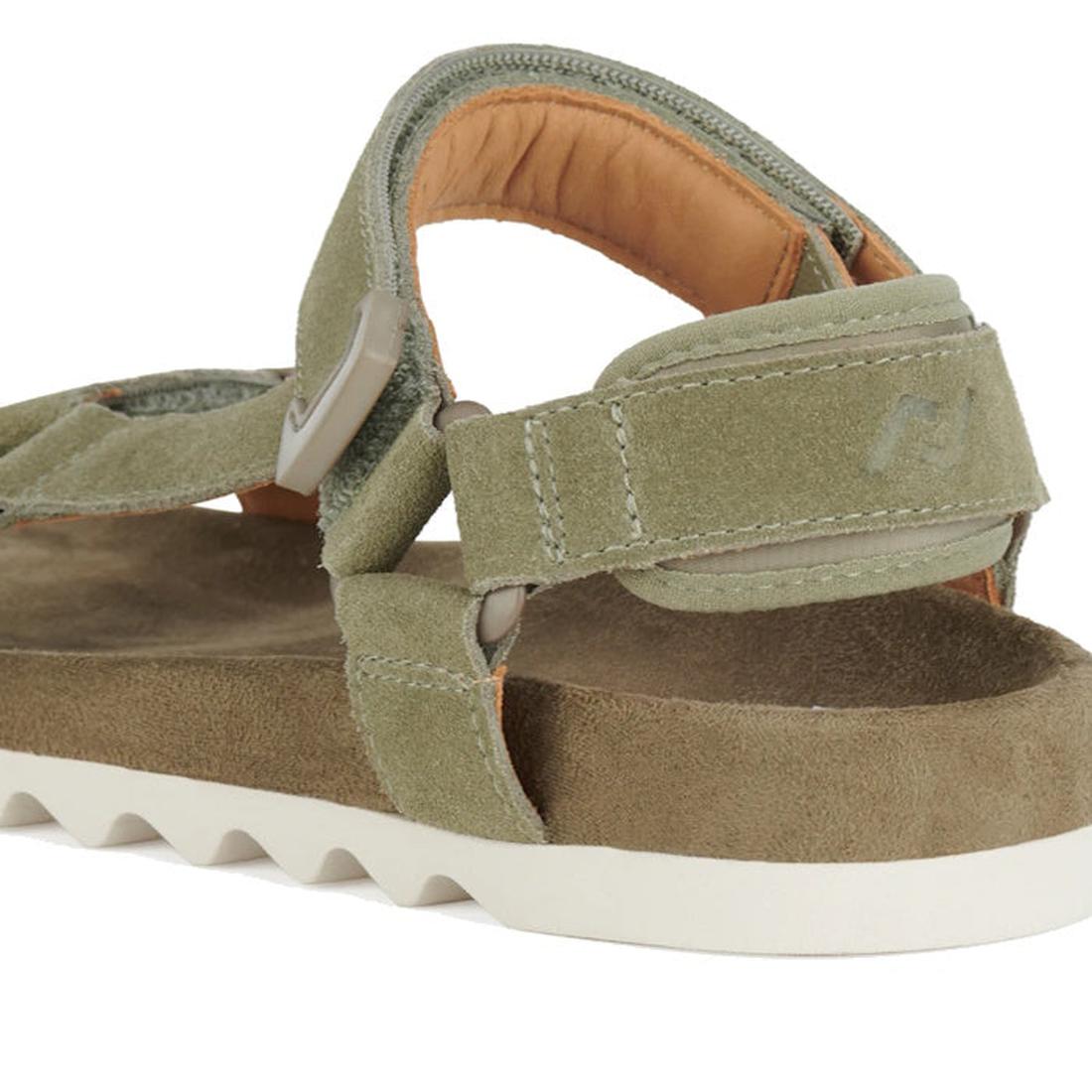 A close-up of the Rollie Womens Sandal Tooth Wedge Sage/White, showing olive green suede and adjustable sheep leather straps with a white EVA sawtooth wedge outsole, highlighting the heel and part of the footbed., 48171, 9781760793883, 9781760793890, 9781