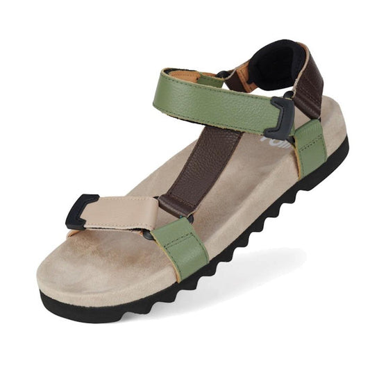 The Rollie Womens Sandal Tooth Wedge Trail Green Brown features a beige footbed, black ridged EVA outsole, and adjustable leather straps in green, beige, and brown with black buckles plus an open-toe and open-heel design.