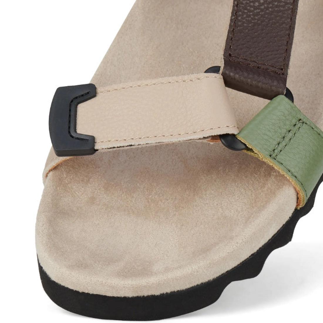 Close-up of the Rollie Womens Sandal Tooth Wedge Trail Green Brown, featuring adjustable beige, green, and brown leather straps with a black buckle on a light tan footbed with an EVA outsole and black sole., 48166, 9781760794064, 9781760794071, 9781760794