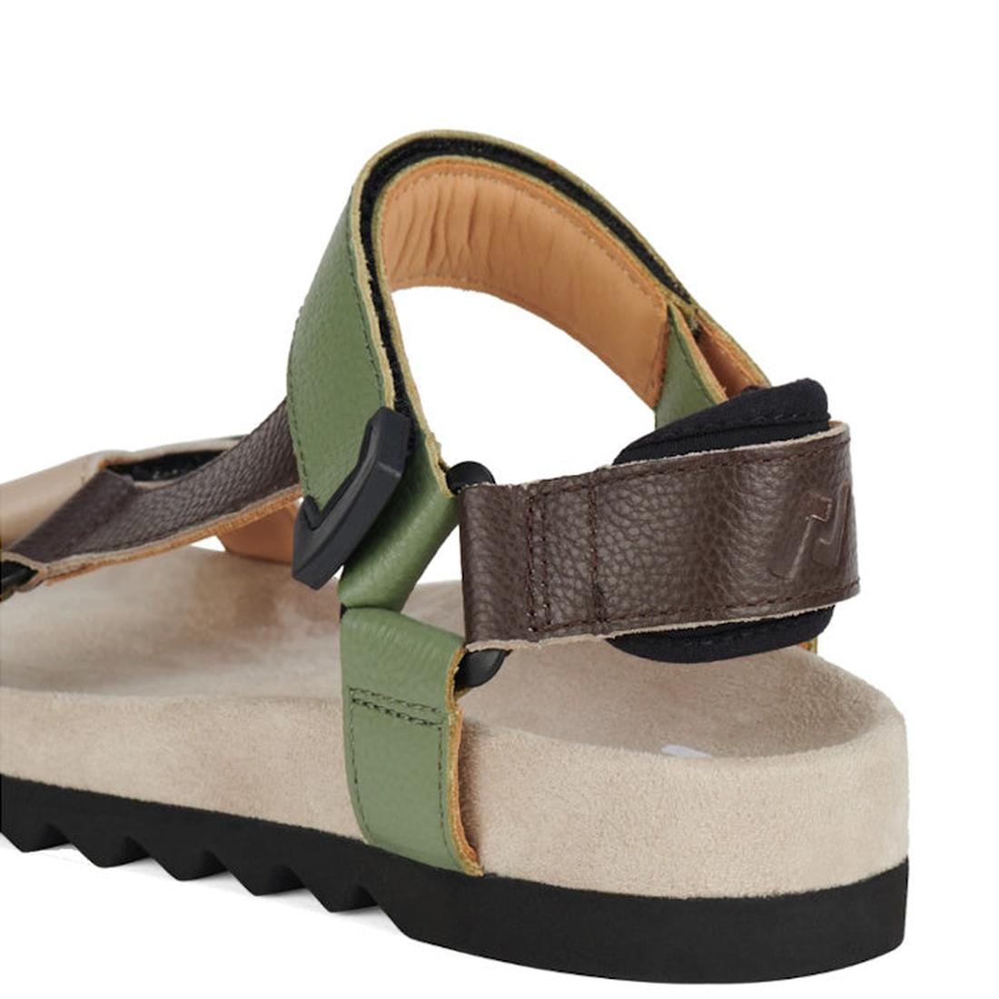 A close-up of the Rollie Womens Sandal Tooth Wedge Trail Green Brown, showing adjustable leather straps in green, brown, and tan, a zigzag black EVA outsole, and a soft beige footbed., 48166, 9781760794064, 9781760794071, 9781760794088, 48170